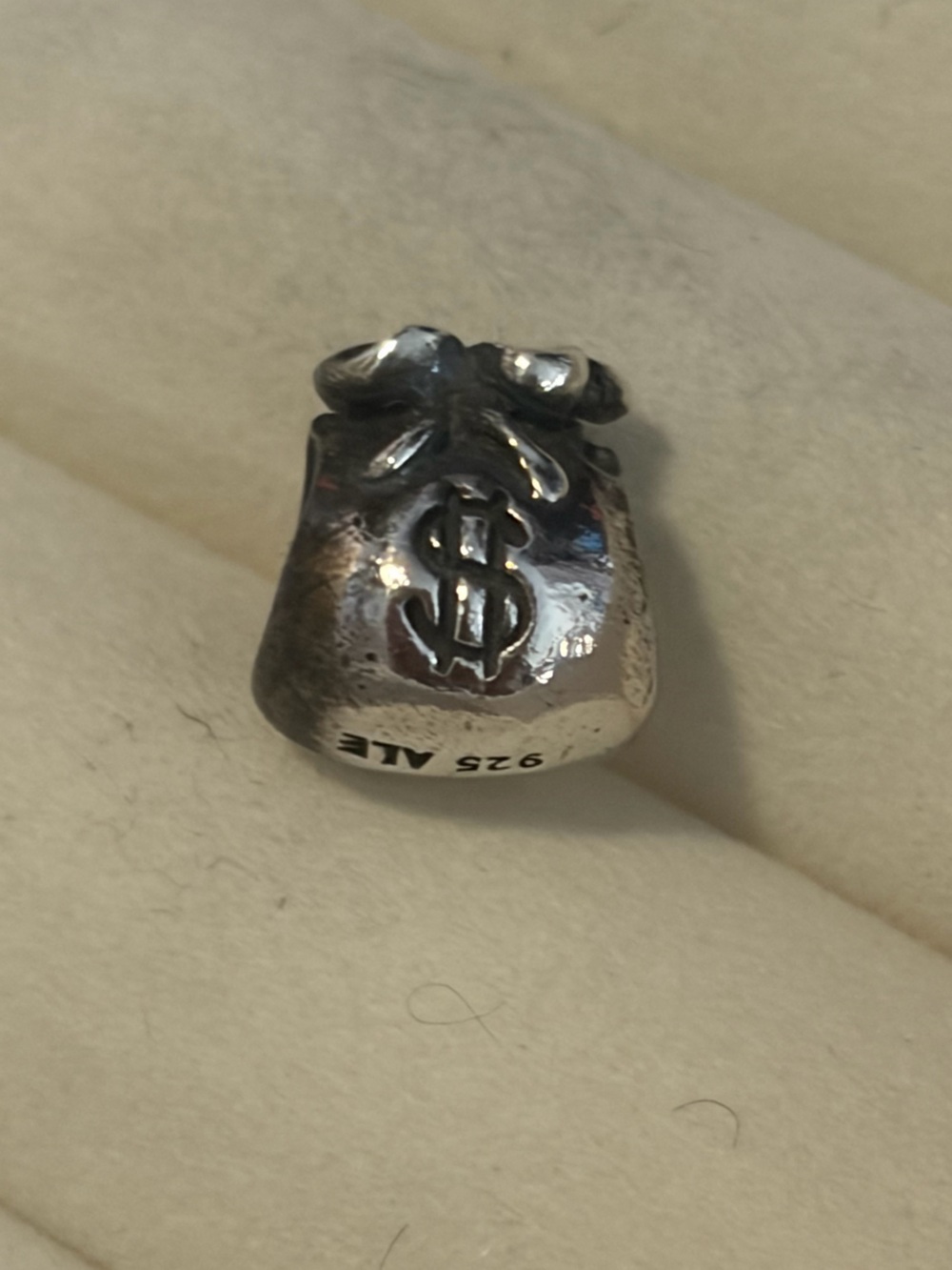 authentic, retired Pandora "Money Bag" charm (Item #790332).